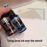 Using spray ink over the stencil